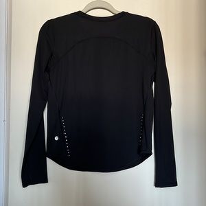 Lululemon black high neck and training long sleeve shirt. Size 4 women's.